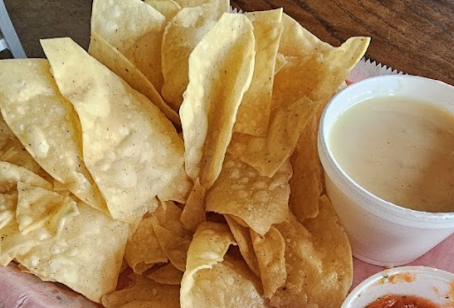 Taco Mama - West Mobile signature dishes Jorge's NachosBarbacoaThe Sizzler
